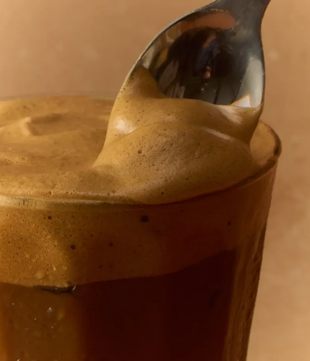 Spoon in a whipped coffee drink