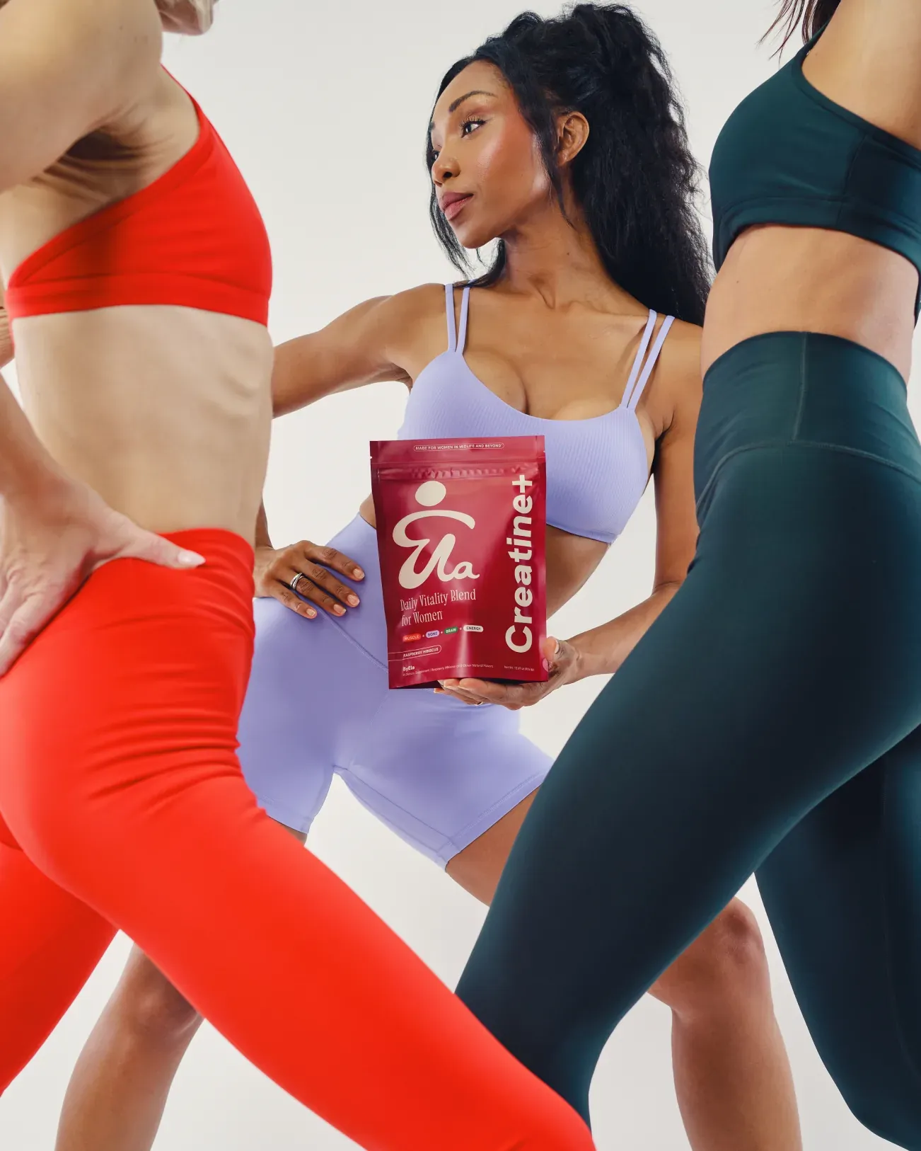 Women in activewear with a ByEla pouch