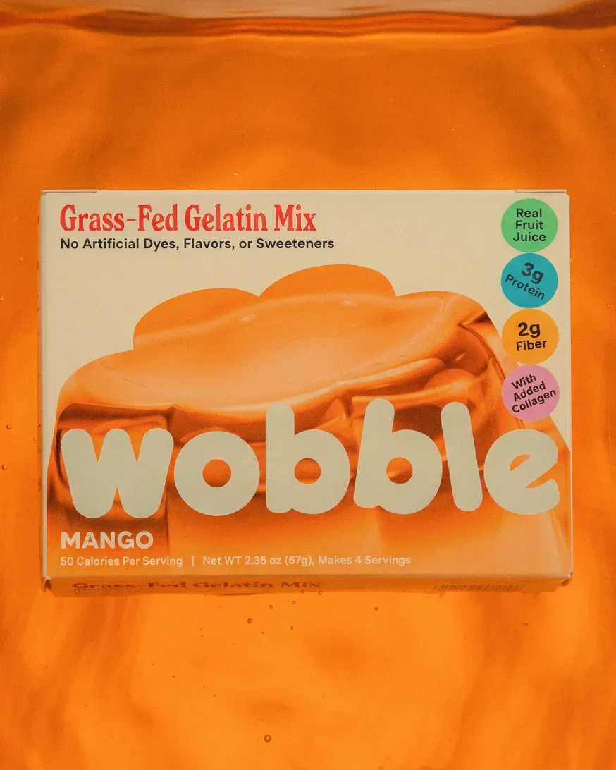 Wobble mango gelatin mix box on orange